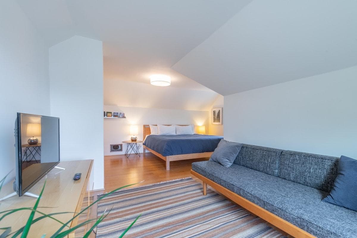 Upstairs king bedroom with separate seating area