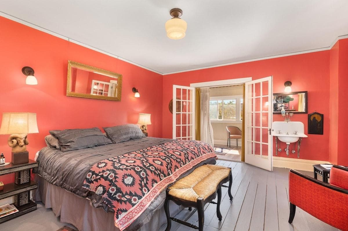 Dibs!! Large master bedroom, with king size bed, extra seating, and private sink with all the amenities. 
